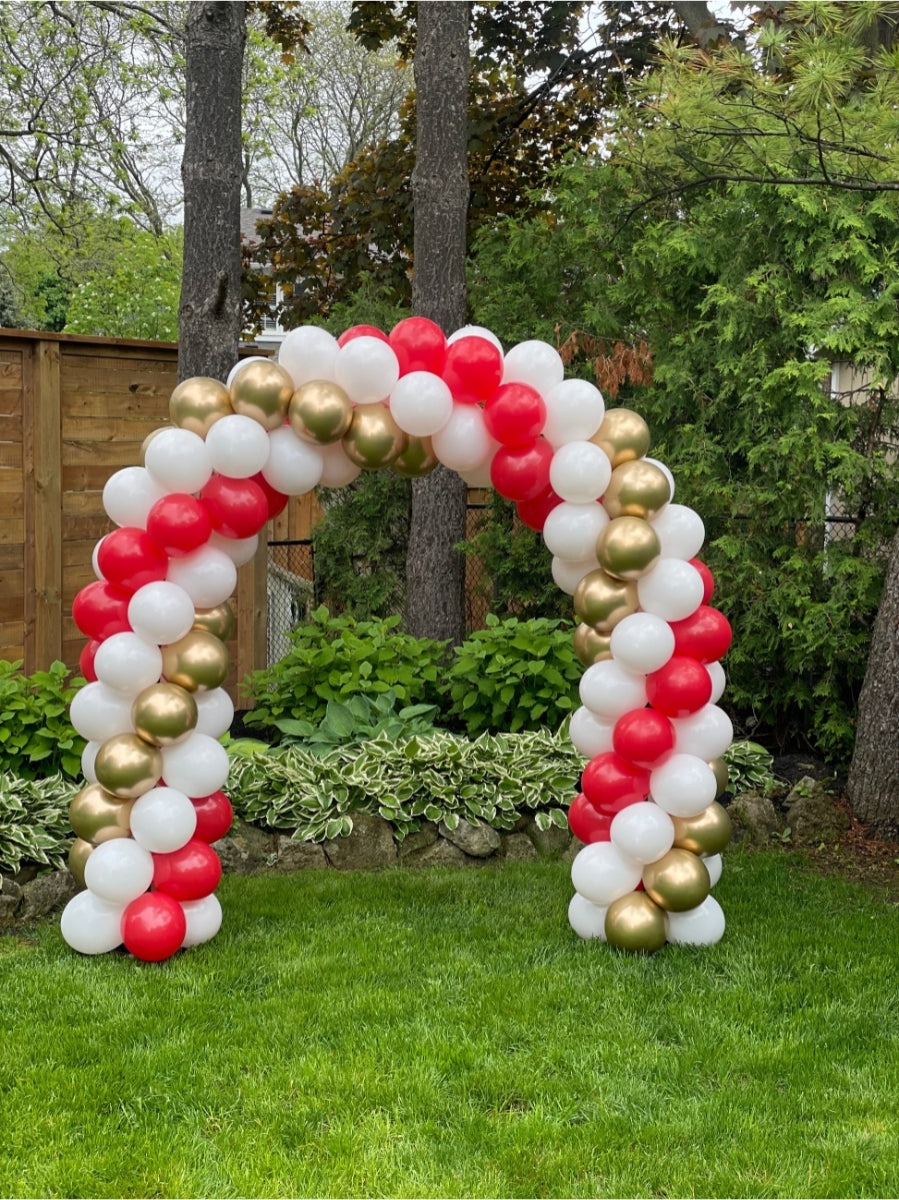 Red, white, and gold graduation balloons